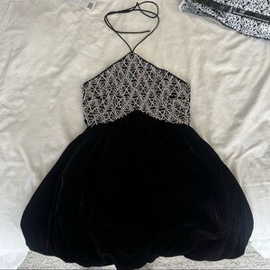 ASOS DESIGN embellished velvet halter mini dress with bubble hem in black